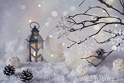 Frosty winter wonderland with snowfall and magic lights. Stock Photo