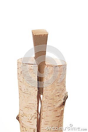 Froth wooden splitting wedge Stock Photo