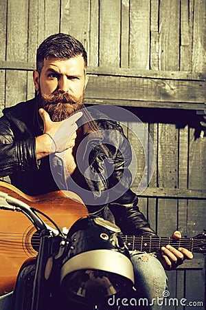 Frown bearded man hipster biker Stock Photo