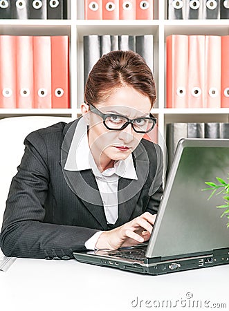 Frown business woman working Stock Photo