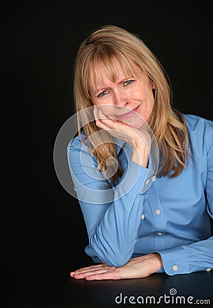 Frowning older woman Stock Photo