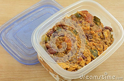 Frozen chili leftovers thawing Stock Photo