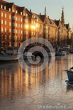 Frozen boat and ships canal in Christianshavn - Copenhagen Denmark Stock Photo