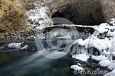 A frozen bridge over river Rak, Slovenia Stock Photo