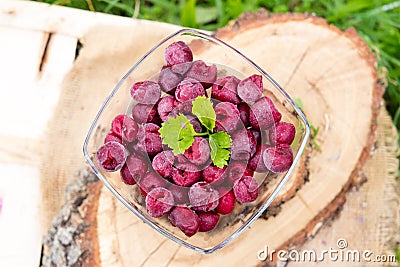 Frozen cherries in a bowl Stock Photo