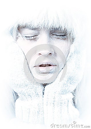 Frozen. Chilled female face covered in ice. Stock Photo