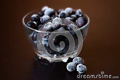 Frozen currant in transparent dish Stock Photo