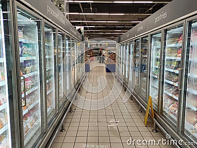 Frozen food that has been packed in commercial packs is stored and displayed in a large chiller. This chiller is able to maintain Editorial Stock Photo