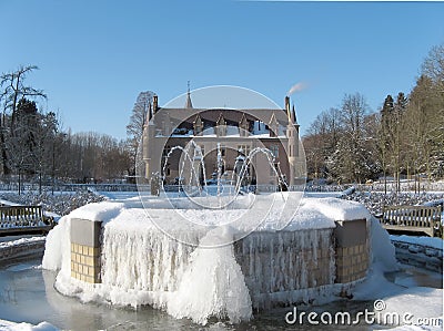 Frozen fountain at castle Stock Photo