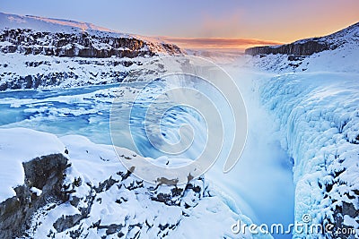 Frozen Gullfoss Falls in Iceland in winter at sunset Stock Photo