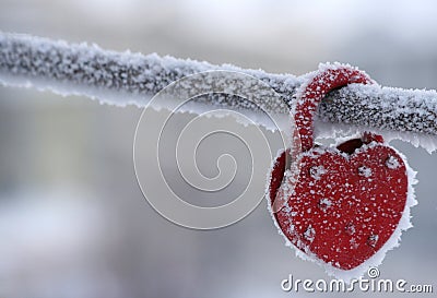 Frozen heart-shaped lock as a symbol Stock Photo