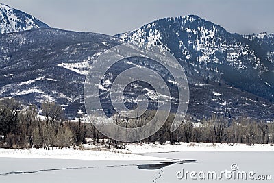 Frozen lake in the northern utah mountains in the winter Stock Photo