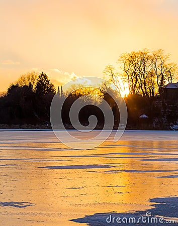 Frozen Lake at Sunset Stock Photo