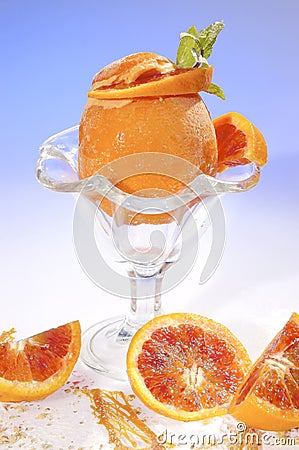 Frozen orange filled by orange sorbet Stock Photo