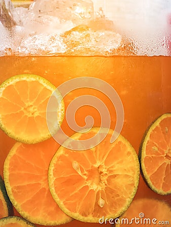 Frozen orange juice in a glass jar. Stock Photo