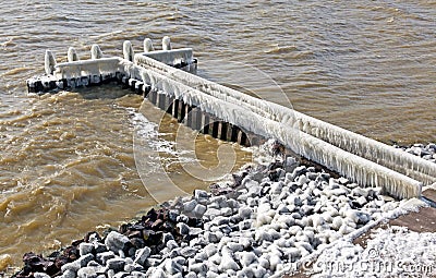 Frozen pier in Afsluitdijk in Netherlands Stock Photo