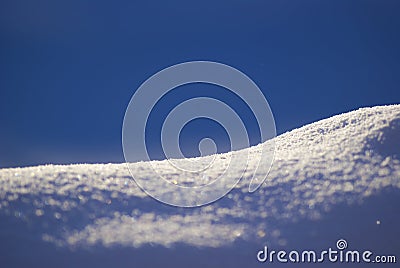 Frozen pile of snow dune closeup background Stock Photo