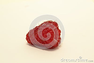 frozen raspberries ifrozen raspberries isolated on a white background on the table Stock Photo