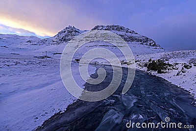 Frozen river near mountains in winter. Winter landscapes and nat Stock Photo