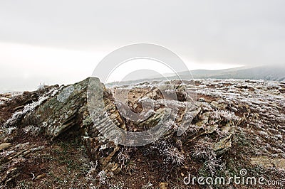 Frozen rock on mountain hill at Carpathians mountains. Stock Photo