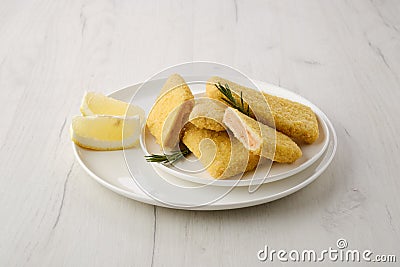 Frozen semifinished salmon patty in breading Stock Photo