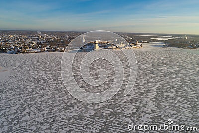 Frozen Siverskoye Lake and Kirillo-Belozersky Monastery in winter landscape Stock Photo