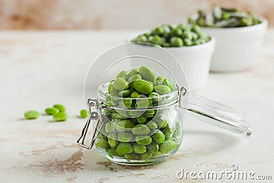 Frozen Soy beans in a glass jar. Freezing is a safe method of increasing the shelf life of nutritious foods Stock Photo