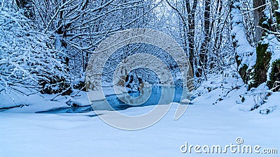 Frozen stream really blue water snow Stock Photo