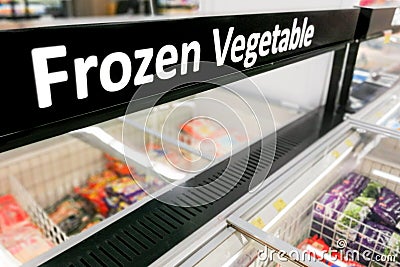 Frozen Vegetable signage at the fresh refrigerated section supermarket Stock Photo