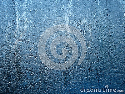 Frozen water on glass window Stock Photo