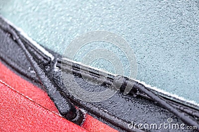 Frozen windscreen and wipers of a car Stock Photo