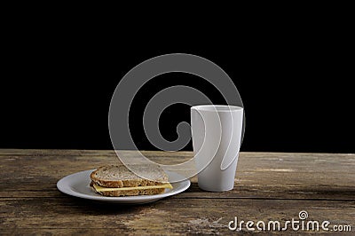 Frugal breakfast on old table Stock Photo