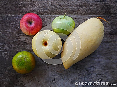 Apple and orange Fruit basket.organic healthy fruit on wood table Stock Photo
