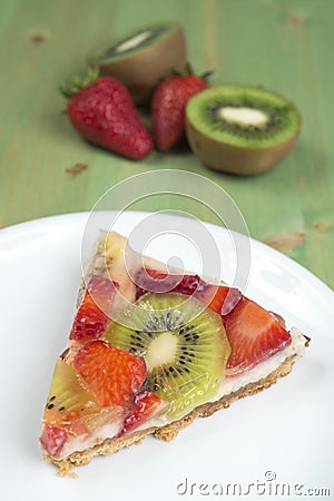 Fruit cake on green table Stock Photo