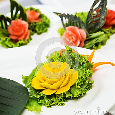 Fruit carvings on the buffet table Stock Photo