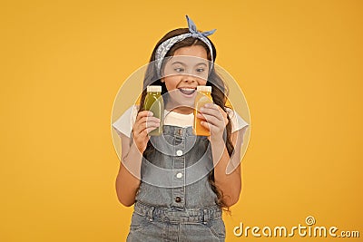 Fruit energy. School lunch. Smiling kid hold smoothie bottles. Healthy food. Vitamin nutrition. Fresh smoothie. Girl Stock Photo