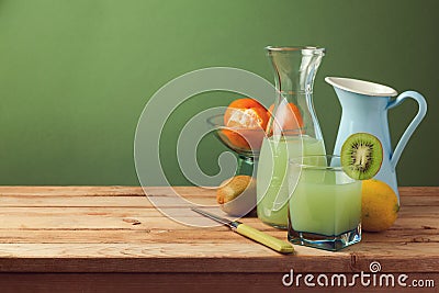 Fruit juice on wooden table with copy space Stock Photo