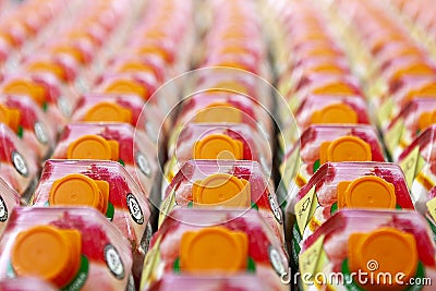 Fruit juices on store shelves in supermarket. Stock Photo