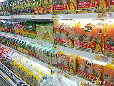 Fruit juices water packs in plastic and paper containers Editorial Stock Photo