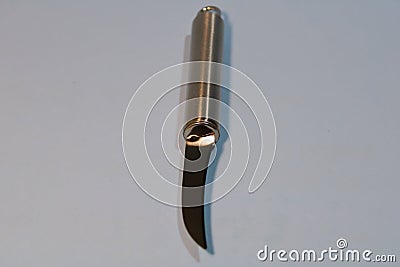 Fruit knife on a gray background. Stock Photo