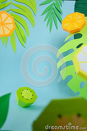 Fruit made of paper. Blue background. Tropics Stock Photo