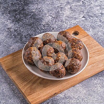 Fruit and nut energy balls in a plate, top view Stock Photo