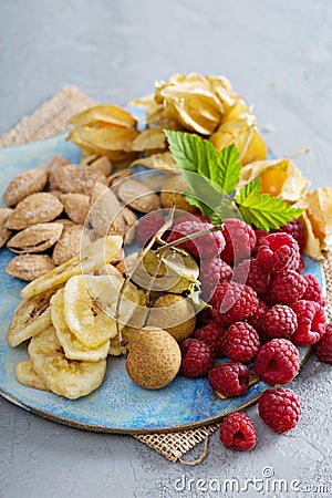 Fruit and nuts snack board Stock Photo