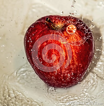 The fruit of red ripe apple in water Stock Photo