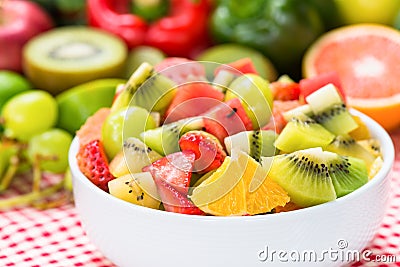 Fruit salad in white ceramic bowl Stock Photo