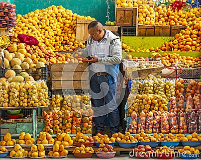 Fruit Seller, Local Market of Otavalo, Ecuador Editorial Stock Photo