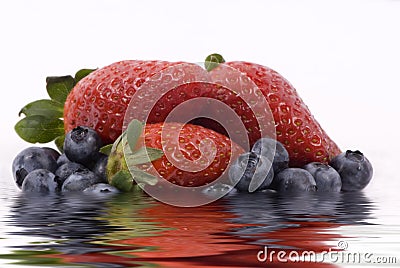 Fruit Series (strawberries and blueberries in water) Stock Photo