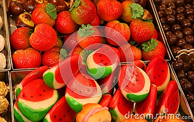 Fruit-shaped marzipan in baskets at a shop Stock Photo