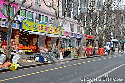 Fruit shop and street scene Shanghai, China Editorial Stock Photo