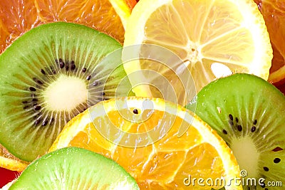Fruit slices (lemon, kiwi, tangerine, orange) Stock Photo